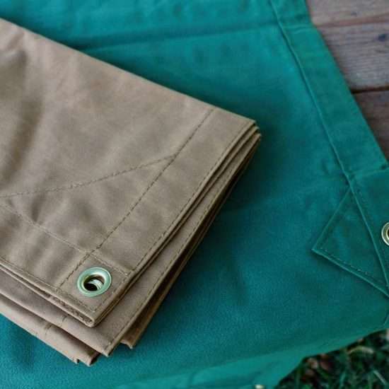 Canvas Camping Tarps Folded on Table