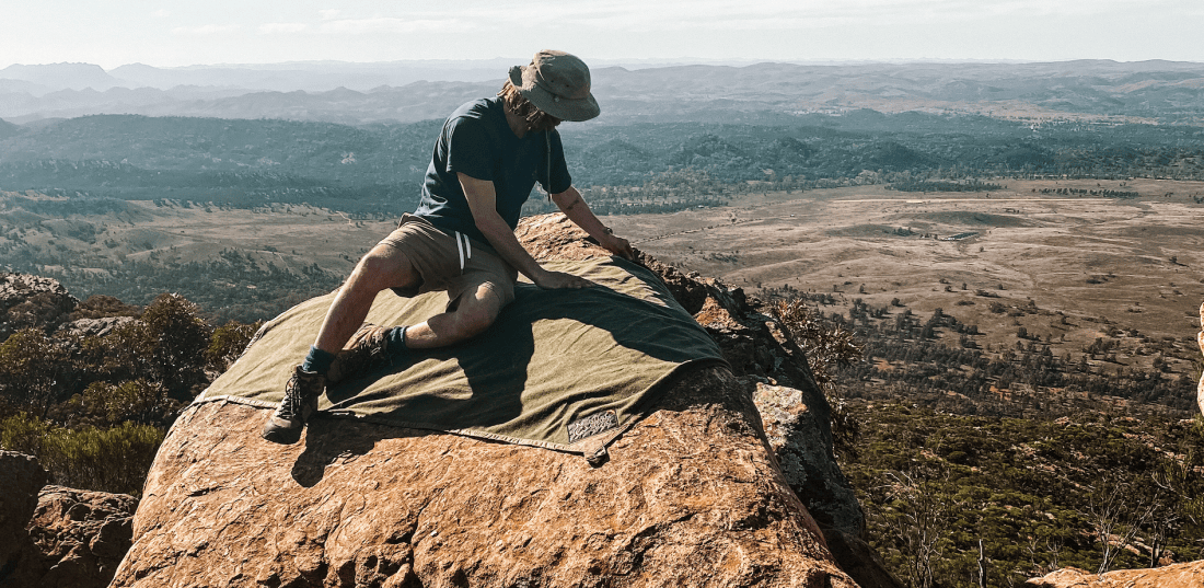 Guy on the oilskin and wool ground cover