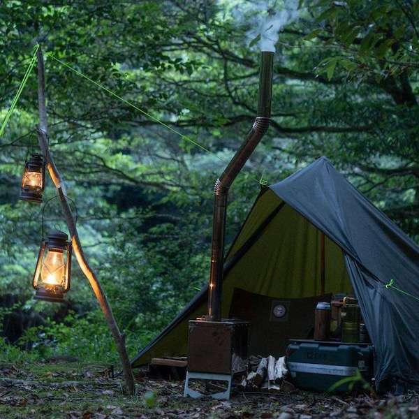 Chimney and fire with Oilskin Tarp in Pyramid Configuration