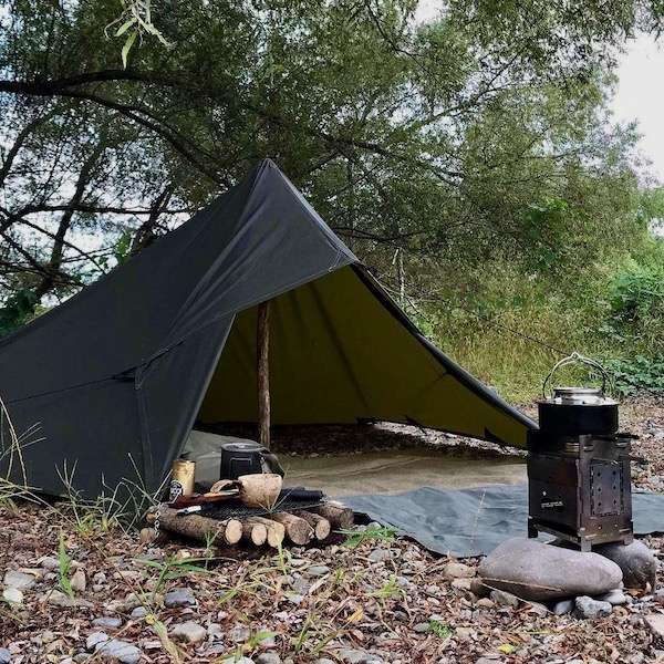 Camping with Oilskin Tarp in Pyramid Configuration